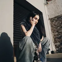 AGNEZ MO