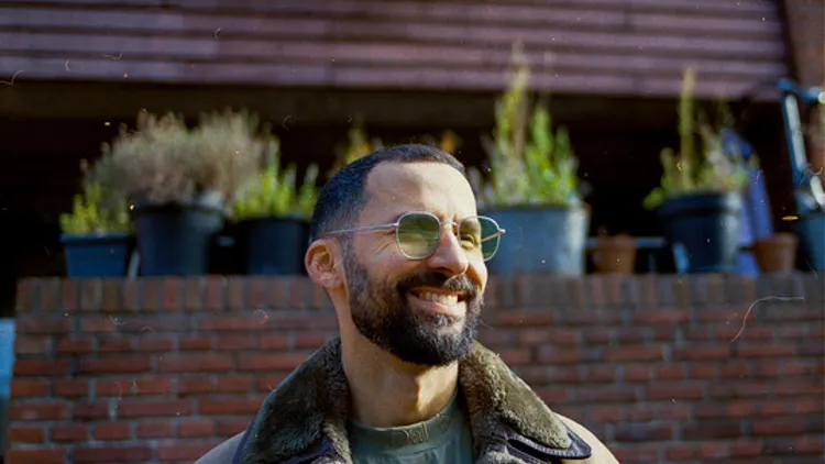 Isam B